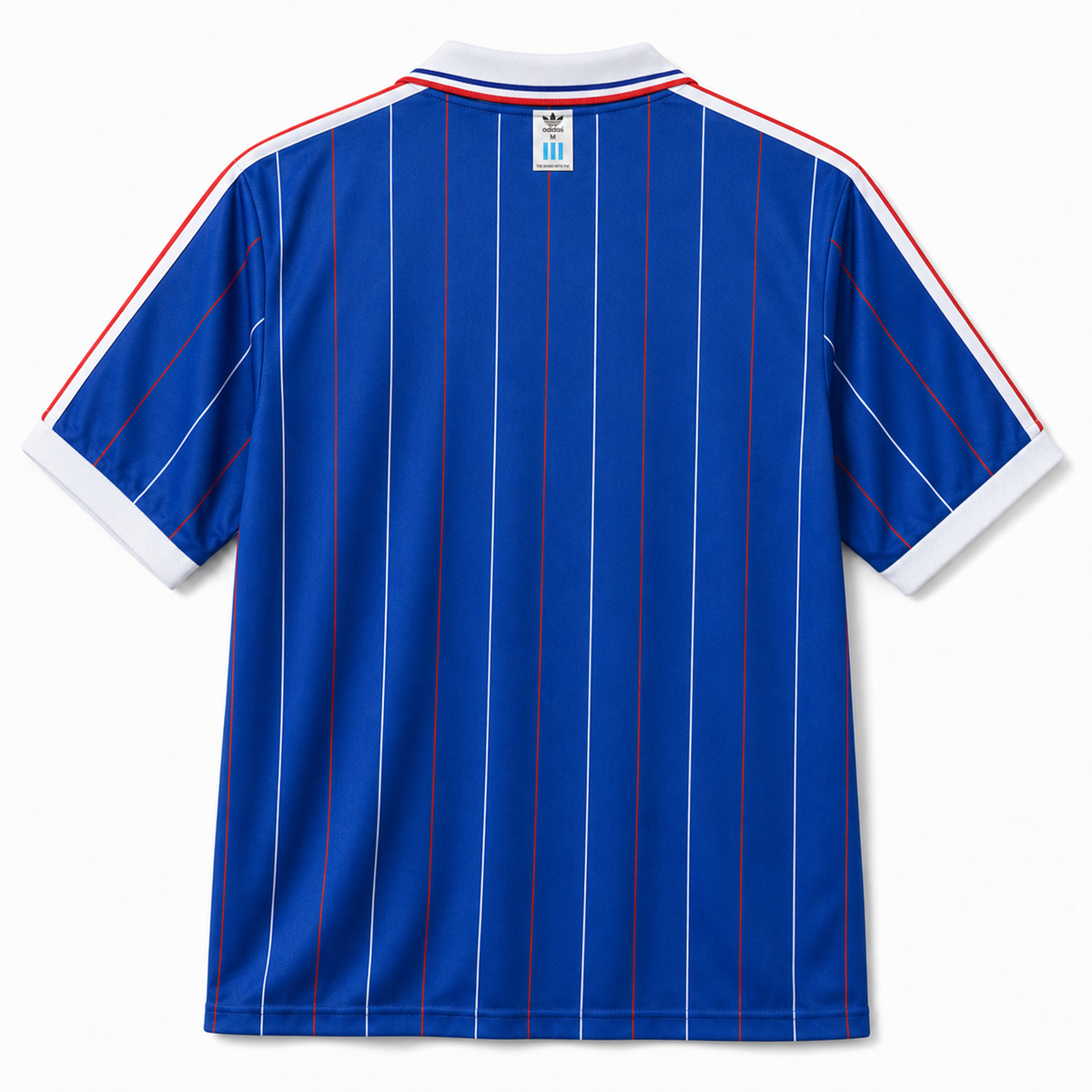 Dos du maillot France 1982 domicile, bleu à fines rayures rouges et blanches