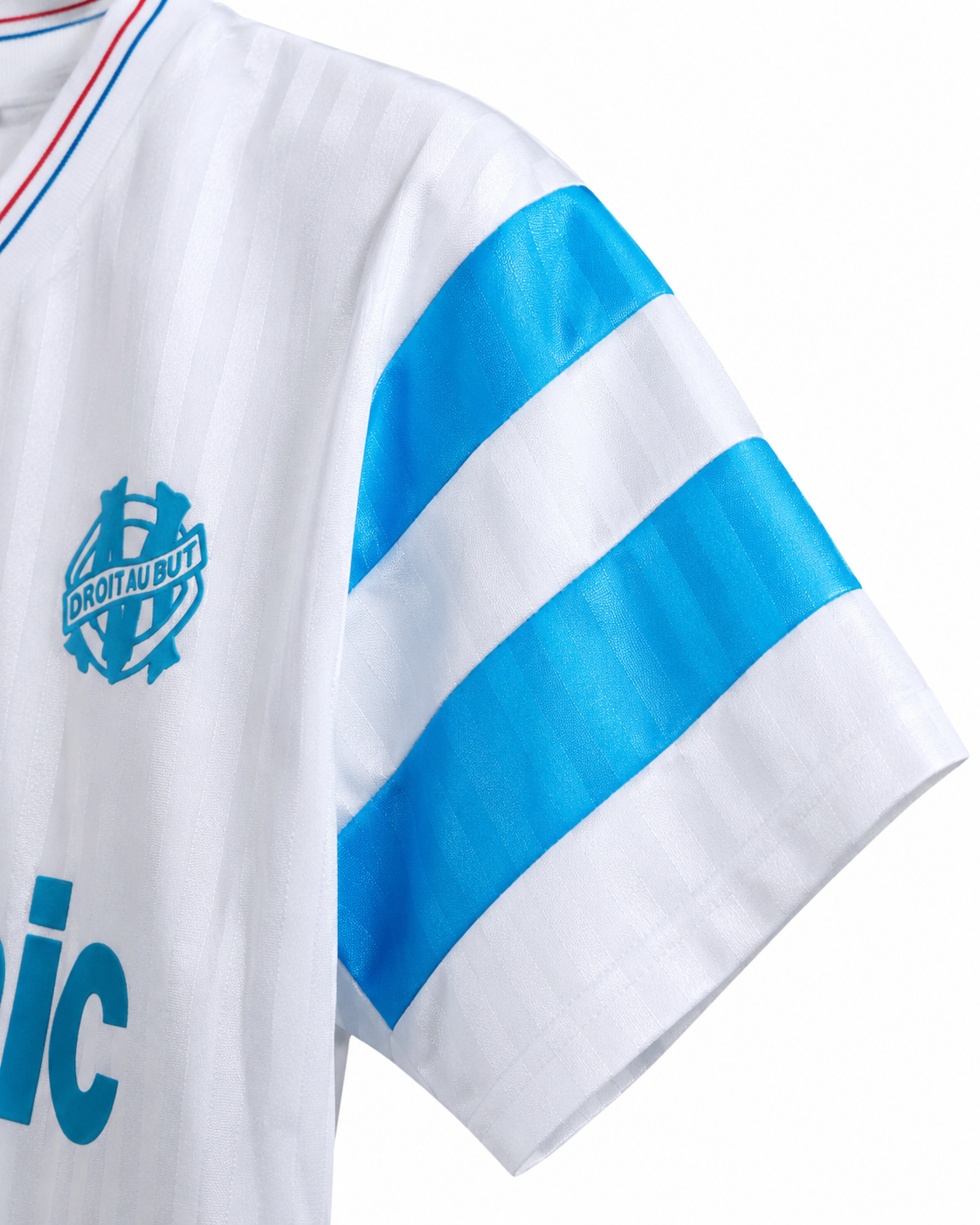 Bandes bleu ciel sur la manche du maillot Marseille 1990